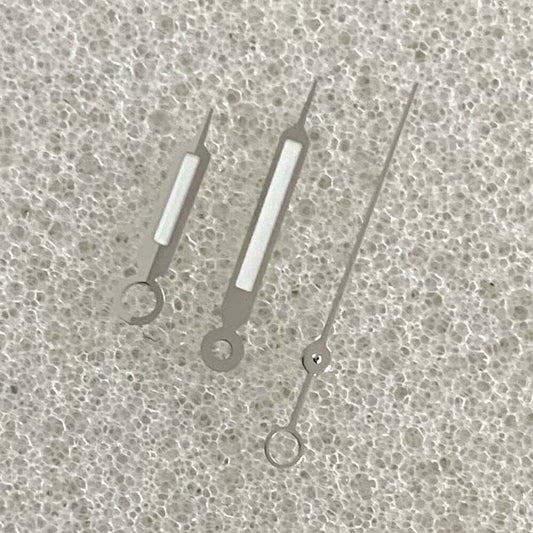 Green luminous watch hands with silver trim for NH35/NH36/4R/7S movements, enhancing visibility and style.