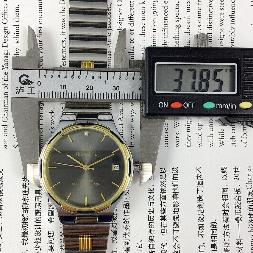 Qionghua 37mm black dial manual steel watch featuring 17 jewels and single calendar for classic style.
