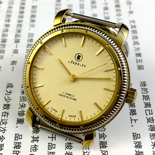 SHANGHAI JINJI 37mm manual mechanical watch with 17 jewels, shock-resistant design, and golden nail markers.