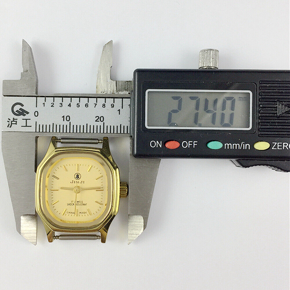26mm SHANGHAI JINJI Lady Watch with golden square case, manual mechanical movement, and 17-jewel precision.