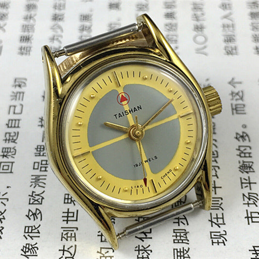 Elegant 27mm Liaocheng TAISHAN manual mechanical lady watch with golden nails, 19 jewels, and 3 hands for precise timekeeping.