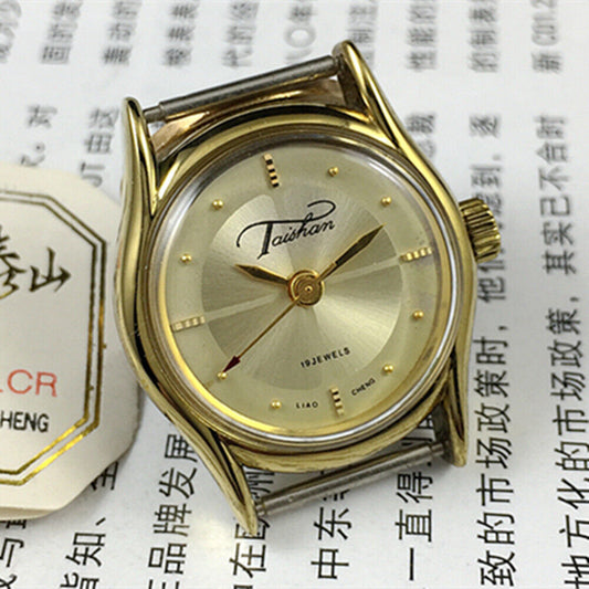 Elegant 27mm TAISHAN manual mechanical lady watch with 19 jewel movement and golden accents from Liaocheng, China.