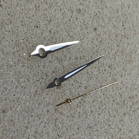 Arrow-shaped silver trim green luminous watch hands for NH35/NH36 movement, enhancing visibility and style.