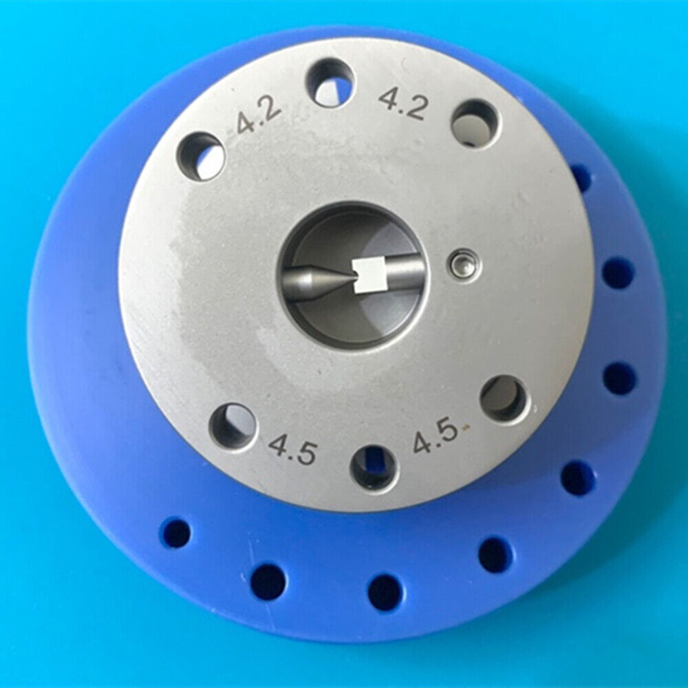 Blue rotated stand for watch balance wheel removal, ideal for precise watch repair tasks.