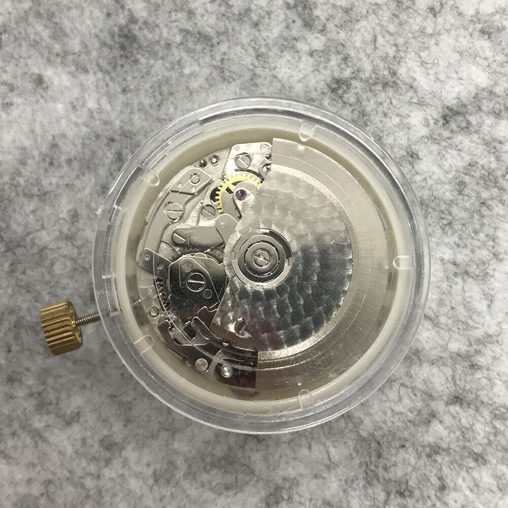 Close-up of Asian 7750 automatic chronograph movement with ETA 7753 layout and subdials at 3, 6, and 9 o?clock.