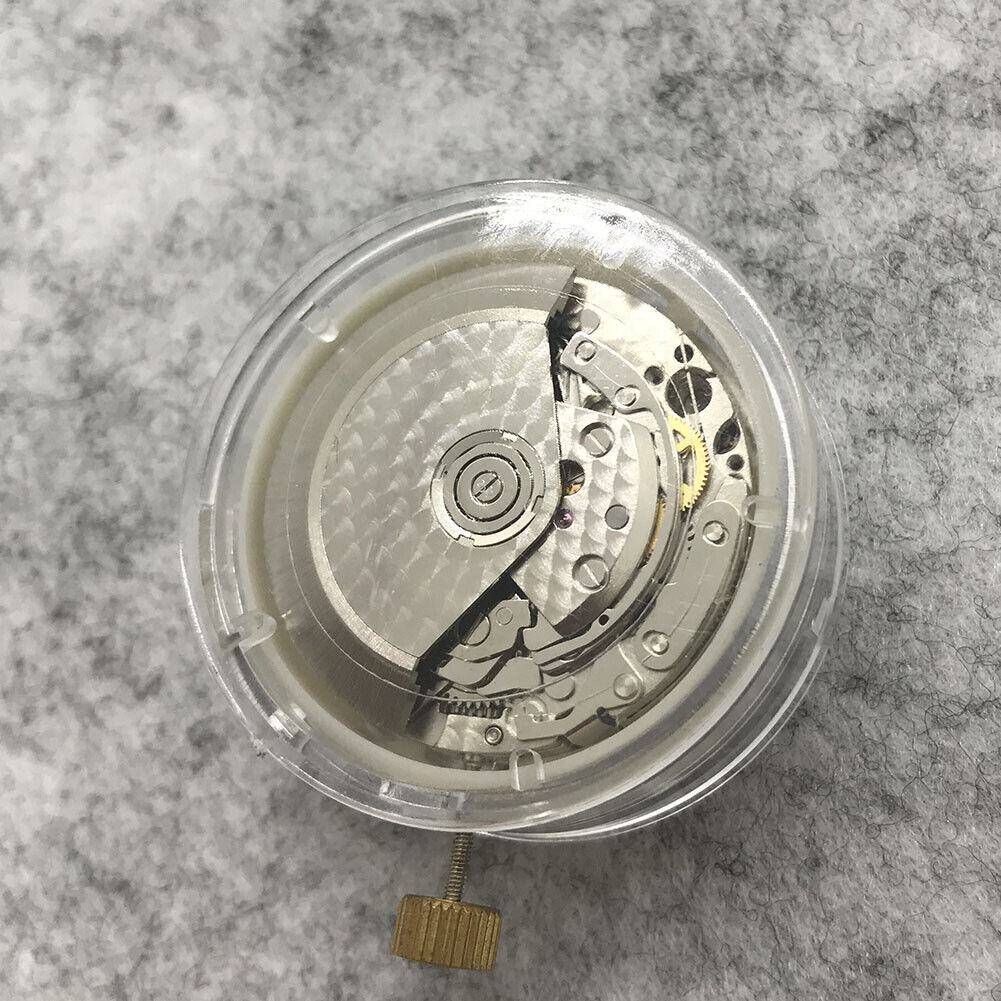 Asian 7750 Automatic chronograph close-up showing ETA 7753 movement with subdials at 3, 6, and 9 o?clock.