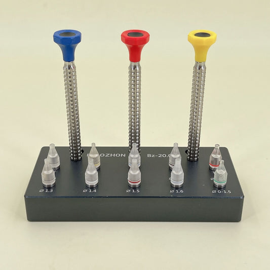 1. Set of 10 watch hand fitting tools with base for precise watch repair.