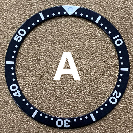 39mm green, blue, and black aluminum bezel inserts for watch repair and customization.