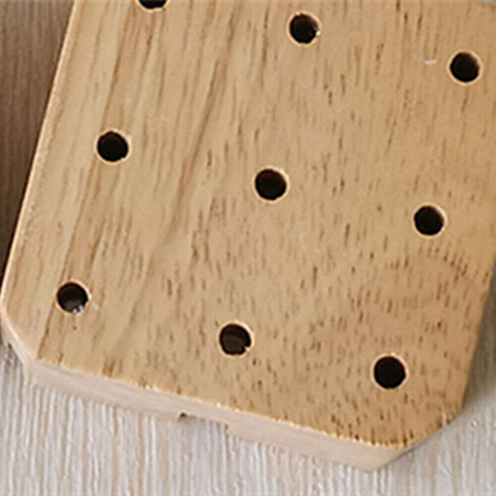 Wooden watch band bracelet holder with pins remover, perfect for watch strap repair.