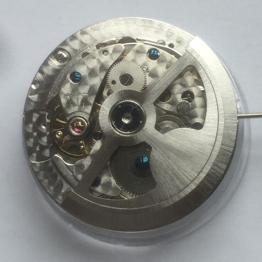 China Made kinetic watch with mechanical movement, small seconds at 9 o'clock, stylish accessory.