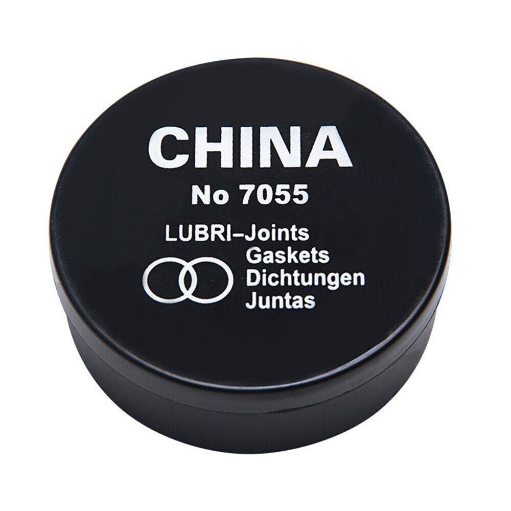 Lubri-Gaskets foam cushions in box, sealing grease for precise watch maintenance and protection.
