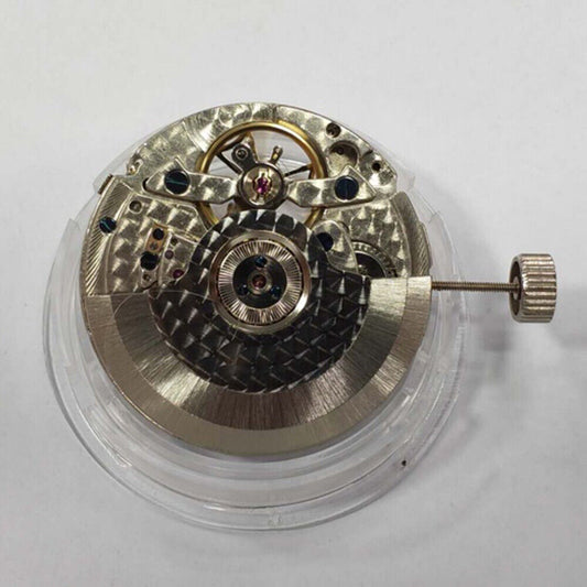 Seagull Tianjin ST2504 mechanical watch movement with week display at 2 o'clock and date at 10 o'clock.
