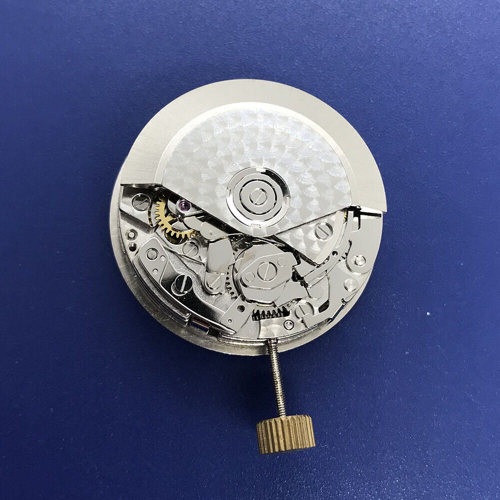 Close-up of Asian 7750 automatic chronograph movement with ETA 7753 layout, showcasing subdials at 3, 6, and 9 o'clock.