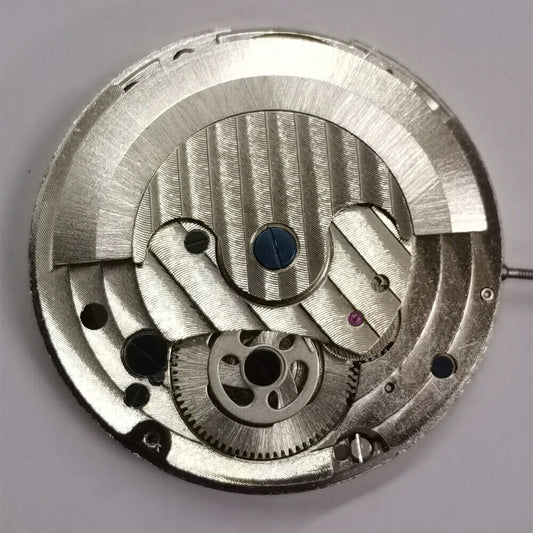 Automatic mechanical watch with silver 3 hands, hollow free wheel, and moon phase at 12, brand featured.