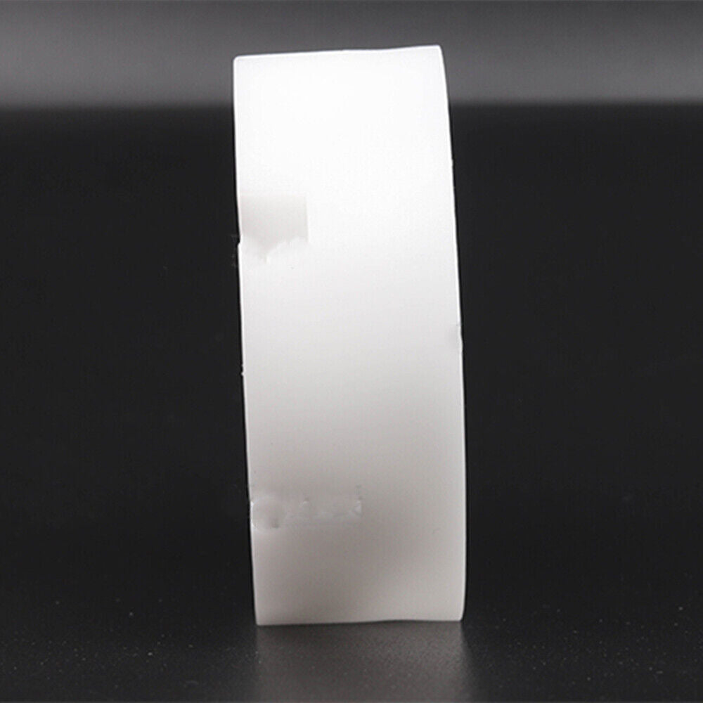 White watch band holder block with pins remover tool for precise strap repair and adjustment.