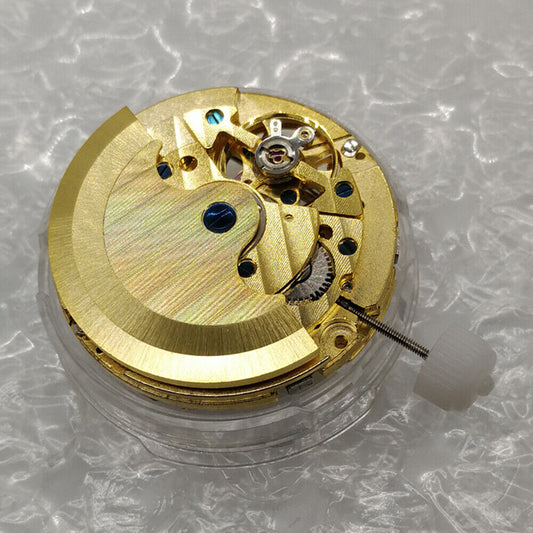 Golden automatic watch with perpetual calendar and big date at 12, China-made precision movement.