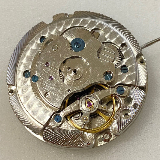 Shanghai multi-function calendar watch with mechanical movement, small second at 9 o'clock, elegant design.