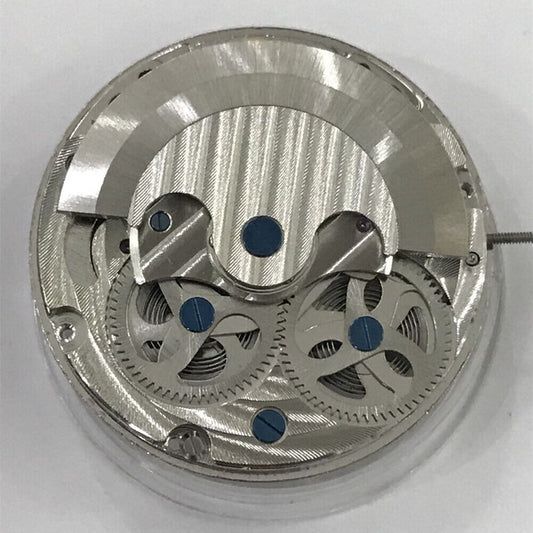 Double Mainspring automatic watch movement by Double Timezone, showcasing precise mechanical craftsmanship.