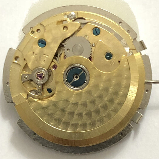 Silver 3 Hands Asian Mingzhu JHB08 mechanical watch movement with date at 6 and small seconds at 3 and 9, precision-crafted by Mingzhu.