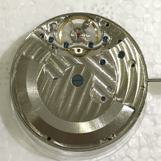 Asian multi-function tourbillon watch with mechanical movement, moon phase, and 24-hour subdial.