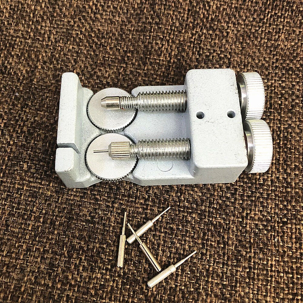 Adjustable metal watch band link remover with 4 pins for precise watch strap adjustment.