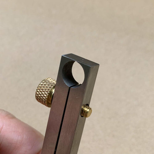 Metal manual Watch Center Wheel Remover by Watch Center, precise tool for watchmakers' repairs and adjustments.