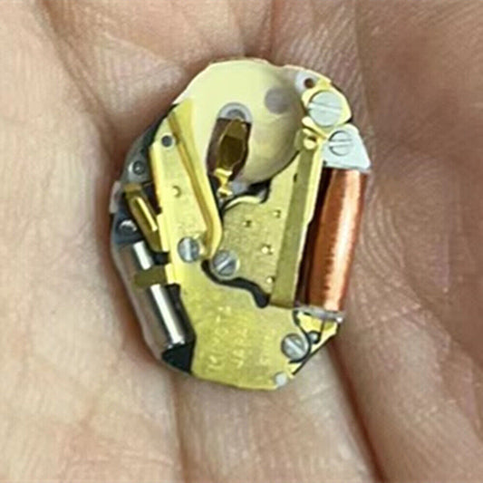 Miyota SUPER 2035 quartz movement with golden finish and precision watch stem for repairs.