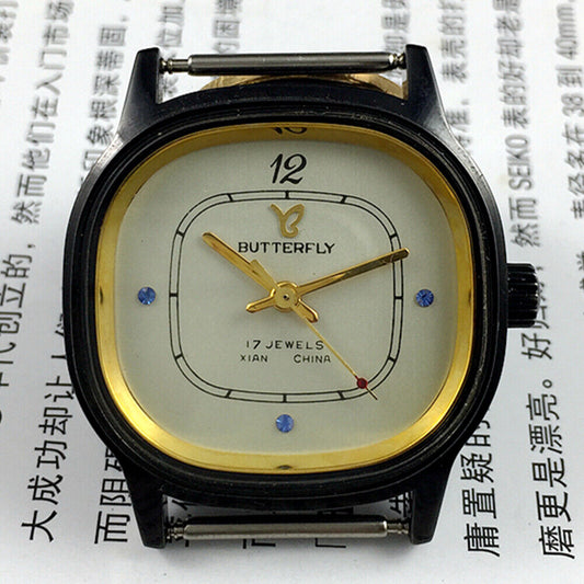 33mm Chinese Xian manual mechanical watch with 17 jewels and blue imitation diamond accents.