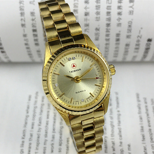 27mm China Made Lady Manual Mechanical Watch with 19 Jewels, golden dial, and elegant golden nail markers.