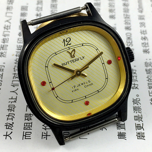 Yellow dial 32mm Chinese Xian manual mechanical watch with 17 jewels in black square case by Xian.