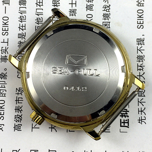 35mm Tianjin Seagull manual watch with golden round case and elegant golden dial