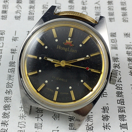 32mm HONGLIAN manual mechanical watch with black dial, golden nails, and 17 jewels, China made.