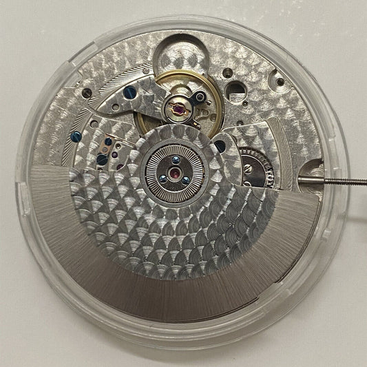 Seagull ST25 watch with date at 3, automatic mechanical movement, kinetic energy, and 3-hand dial design.