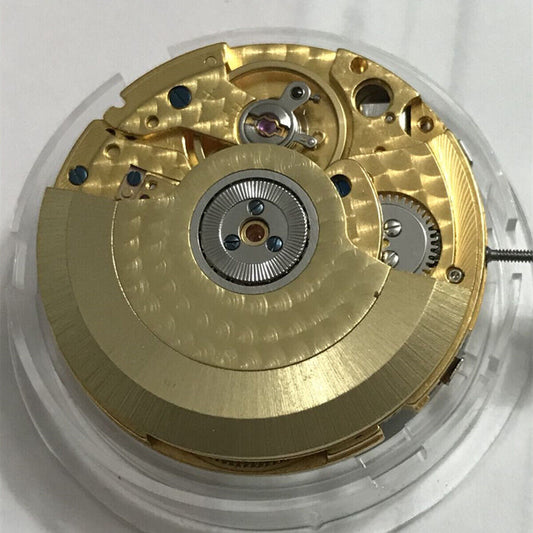 Tianjin Seagull ST25 watch movement with golden finish for precise automatic timekeeping.