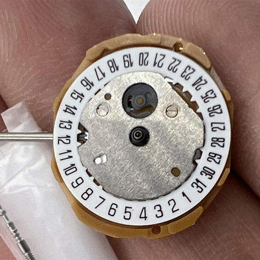 Miyota GL10 Japan quartz watch movement with 3 hands and date display at 6 o'clock.