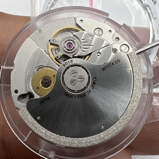 Miyota Citizen 9019 automatic watch movement with date display at 3 o'clock, precise mechanical design