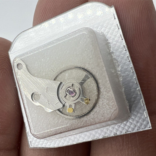 Japan made silver watch balance wheel with splint, compatible with NH35 NH36 movements for precise timekeeping.