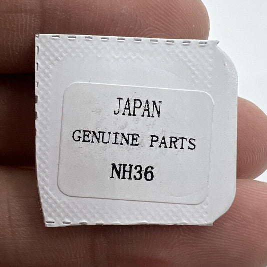 Japan made silver watch balance wheel with splint, compatible with NH35 NH36 movements for precise timekeeping.