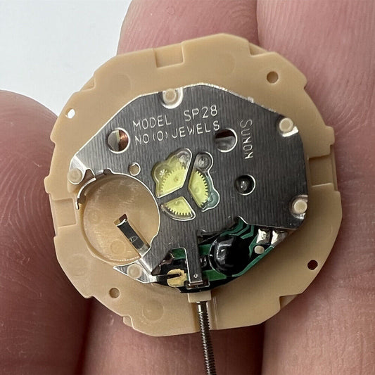 Sunon SP28 quartz watch movement with date display at 3 o'clock, 3-hand precision mechanism