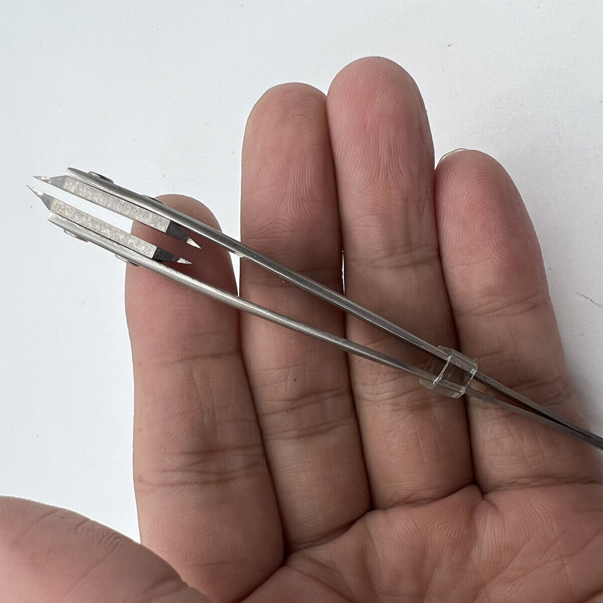 Bergeon 7825 precision spring bar tweezer for easy lug removal and watch strap changes.