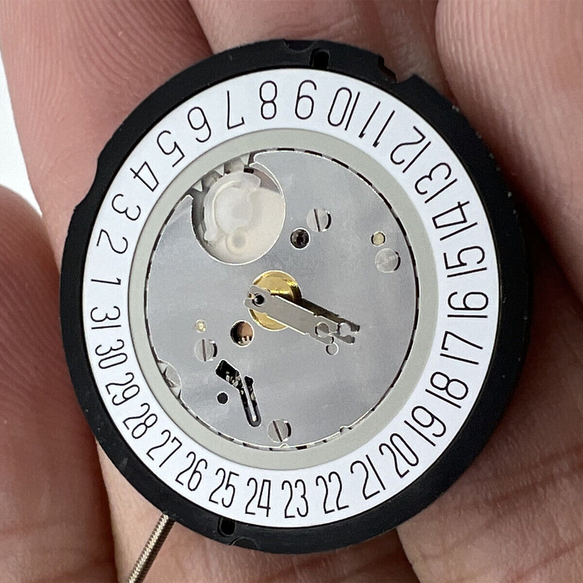 H2 Ronda 515 Quartz watch movement with date at 6, Swiss parts, high canon pinion for precision.