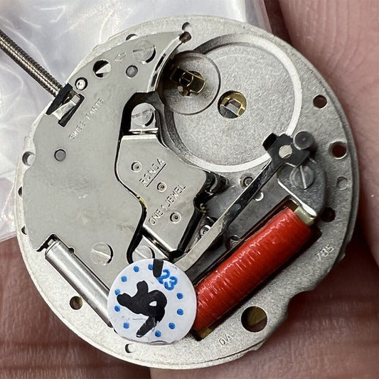 Ronda 784 quartz watch movement with date display at 3 o'clock, Swiss precision parts.