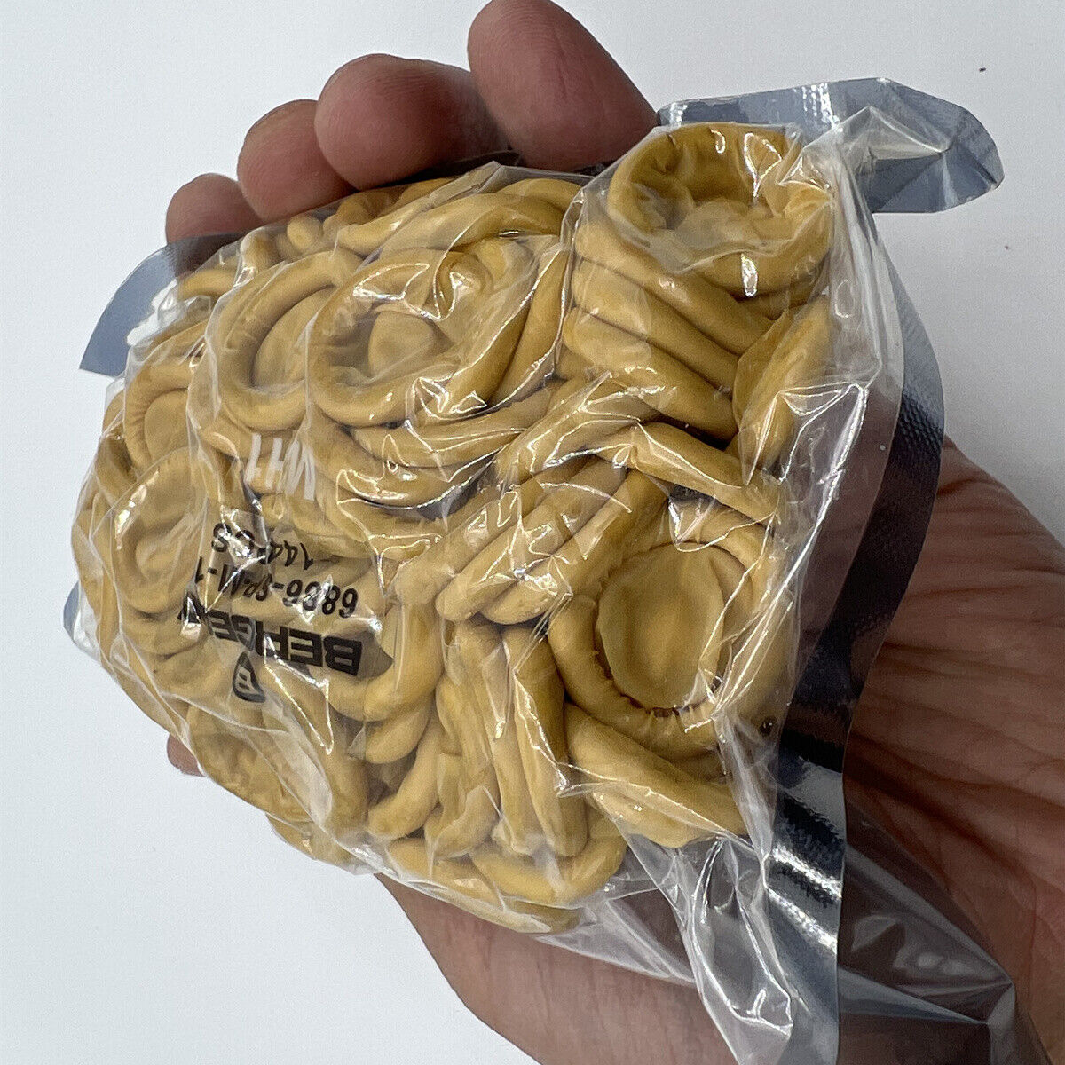 Bergeon 6886-SP-M pack of 144 rubber finger protection thimble cots for watchmaking precision tasks.