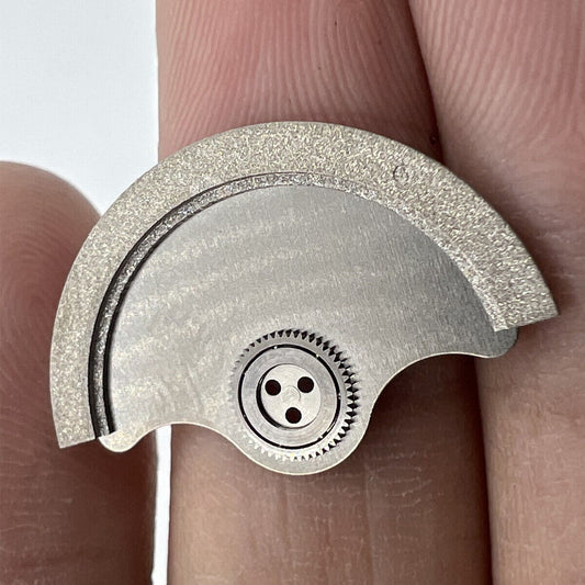 Rotor oscillating weight for Miyota 9015 watch movement, precision part enhancing automatic winding efficiency.