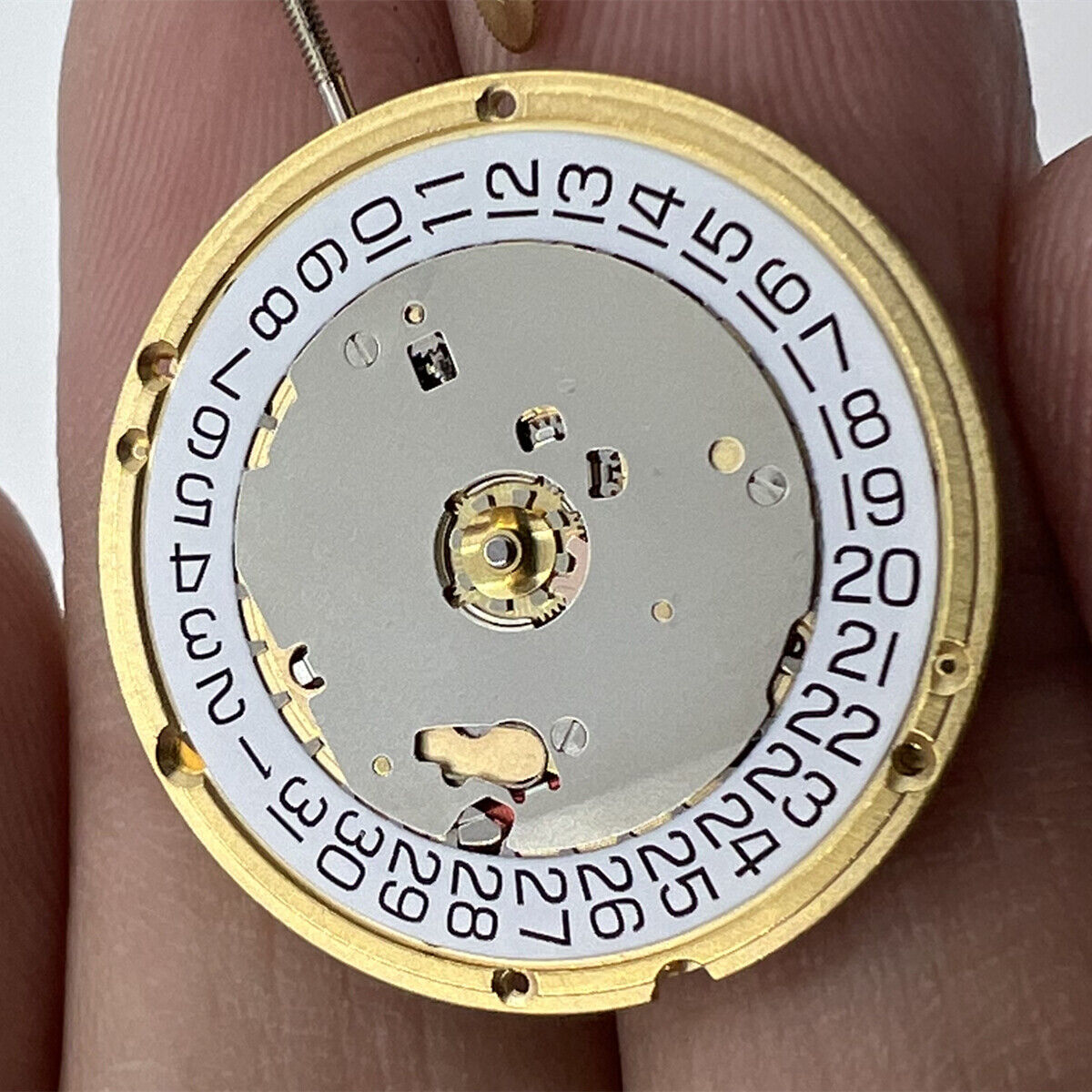 ETA E63.041 Swiss quartz watch movement with 2 hands and date display at 3 o'clock, precision timekeeping.