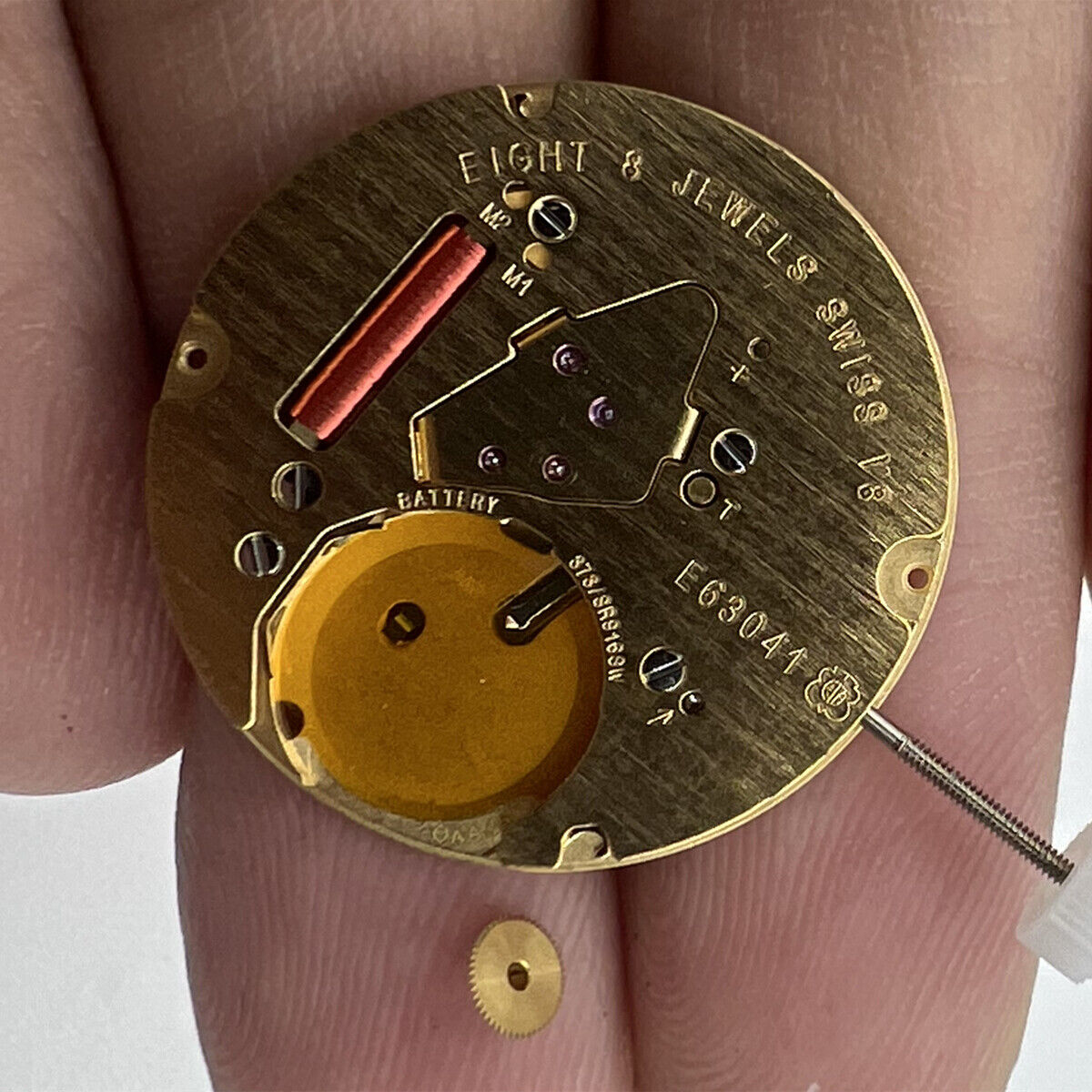 ETA E63.041 Swiss quartz watch movement with 2 hands and date display at 3 o'clock, precision timekeeping.