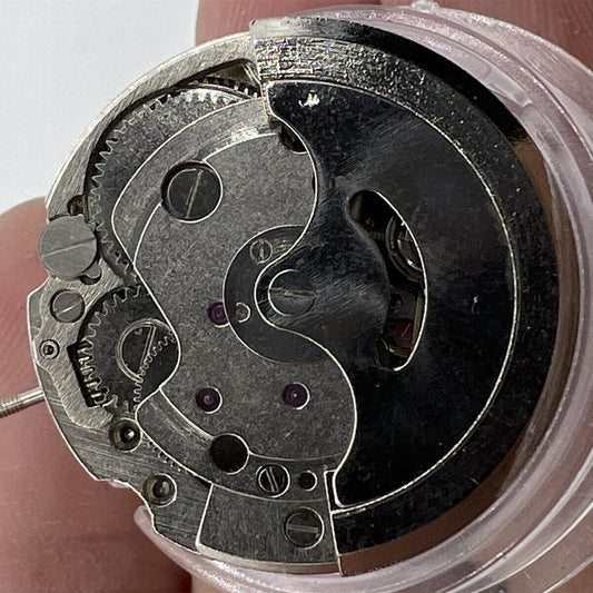 26.5mm 7120 automatic mechanical watch movement with single calendar and three hands for precise timekeeping.