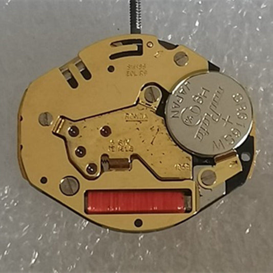 Ronda 1069 Swiss Quartz watch movement with golden plated finish, precision timekeeping accessory.