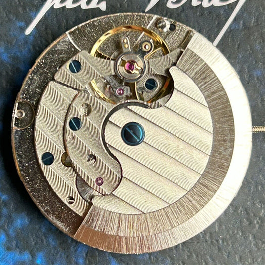 Shanghai LB20 watch accessory featuring automatic mechanical movement, moon phase at 6, big date at 12, China made.