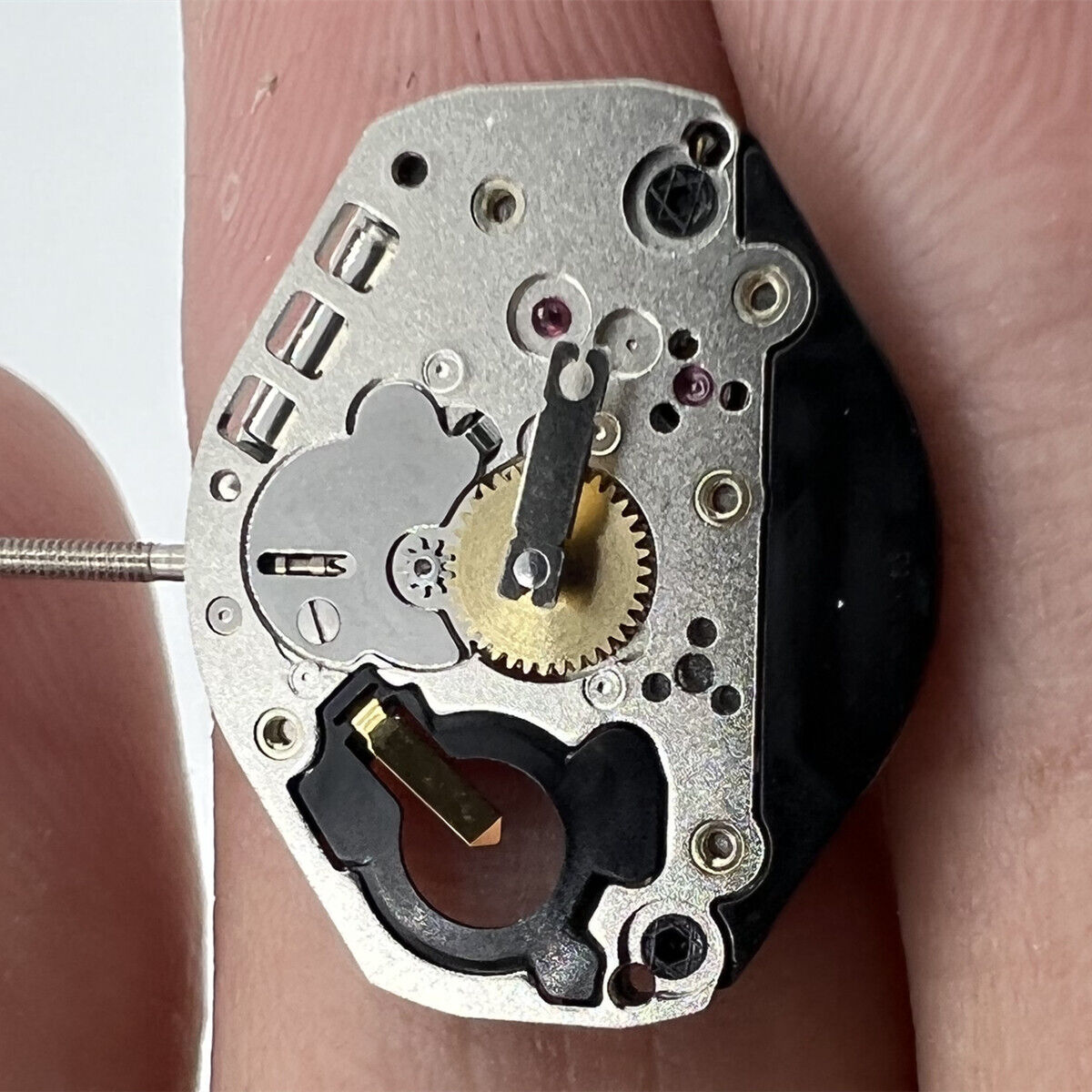 Ronda 1064 Swiss quartz watch movement with high canon pinion for precise timekeeping.